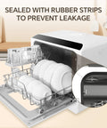 No Sweat Countertop Dishwasher With Built In Water Tank showing rubber seals, compact design, and plates in loaded rack.