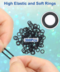 Close-up of elastic O rings from Dual Wacky Rig Tool Set With 320 Elastic O Rings And Wacky Worm Rig Kit, being stretched by hand.