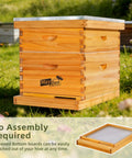 8 Frame Screened Bottom Board For Langstroth Beehives with beeswax dipped solid wood base and ventilation in garden setting.