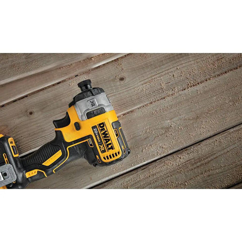 Impact Driver 20V Max XR Brushless Cordless with Three Speed Settings and Quarter Inch Chuck Tool Only on wood surface