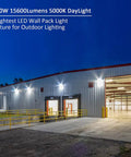 Beefy 120W LED Wall Pack Flood Light illuminating warehouse exterior, 5000K daylight, waterproof ETL listed, dusk-to-dawn photocell