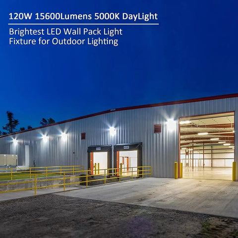 Beefy 120W LED Wall Pack Flood Light illuminating warehouse exterior, 5000K daylight, waterproof ETL listed, dusk-to-dawn photocell