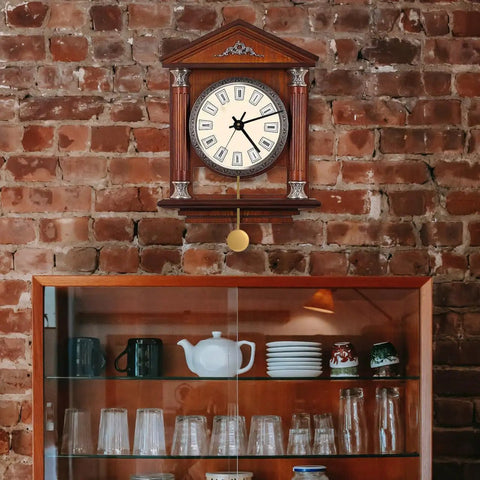 Metal Pendulum Clock Replacement Part, 5.90 Inch Wall Clock Accessory displayed on brick wall above kitchen cabinet