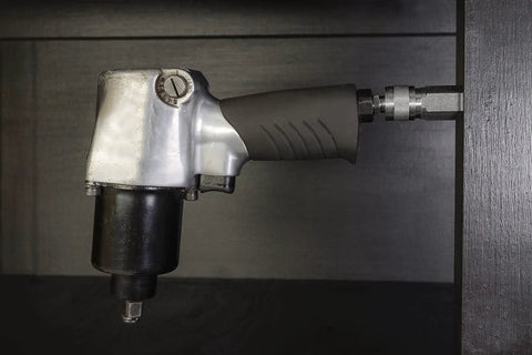 Locking Air Tool Holders Five Pack For One Quarter Inch Pneumatic Tools mounted on a wooden surface