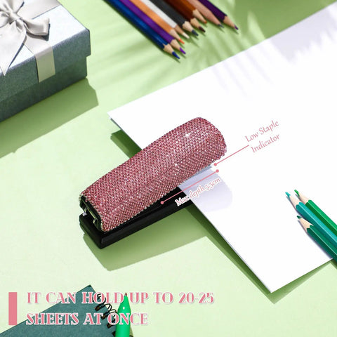 Pink Sparkle Bling Stapler With Rhinestone Glitter 20 Sheet Capacity Includes 1000 Staples on desk with pencils and gift box