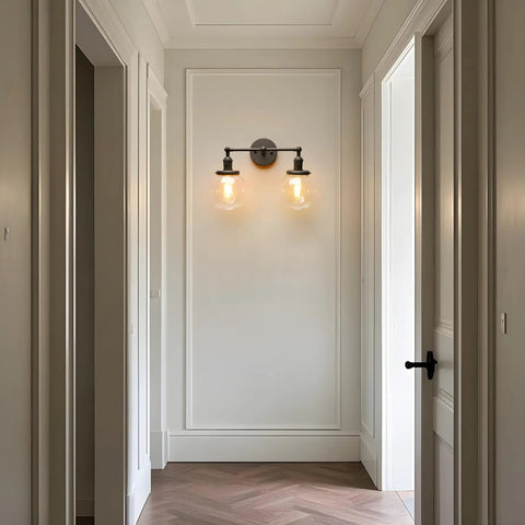 Vintage Industrial Double Wall Sconce In Black With Dual 5.9 Inch Clear Glass Globe Shades mounted in hallway
