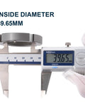 Caliper measuring inside diameter of Locking Hub Spindle Nut Conversion Kit 32720 For Dana 44 And Dana 30 CJ Front Axles