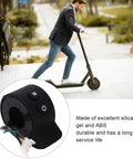Finger Throttle For Electric Scooters Ultra Sensitive Accelerator Control Slick Quick Response Easy Install Replacement Part With Convex Stripes Fits Most Models Black, close-up of black throttle with buttons and wires against scooter rider background.