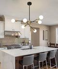 Sputnik Chandelier Pendant Light Black And Gold in a kitchen setting, mid-century modern industrial E26 ceiling fixture