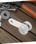 Heavy Duty Sliding Door Roller Wheels With Dual Bearing Iron Groove Caster on wooden surface among various hardware tools.