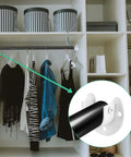 Heavy Duty Stainless Steel Closet Rod End Supports securely hold black rod with white wardrobe bracket in modern closet.