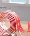 Clear Self Adhesive Corner Protectors 5m Roll, 10mm Edge Guards for furniture safety shown in rolled position on table.