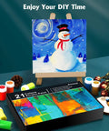 Top Notch Acrylic Paint Set With 31 Rich Colors and 10 Brushes for Canvas, Wood and Crafts, displayed with a snowman painting.