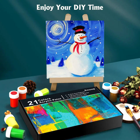 Top Notch Acrylic Paint Set With 31 Rich Colors and 10 Brushes for Canvas, Wood and Crafts, displayed with a snowman painting.