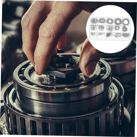 Hand installing 175 Piece Steel C Type External Circlip Snap Ring Assortment Kit For Automotive And Machinery In Clear Storage Case.