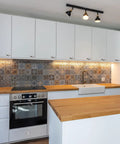Modern kitchen with Retro Ceramic Cabinet Knobs Set of 4 1-1/4 Inch White Vintage Round Drawer Pulls installed on white cabinets.