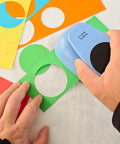 Using Two And A Half Inch Circle Hole Punch Cutter For Paper Crafts Cardstock Gift Wrapping And Scrapbooking on colorful paper