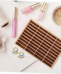 Vintage Wood Jewelry Dish With Integrated Smartphone Stand Multi Compartment Accessory Organizer For Rings And Chains on a desktop with cosmetics.