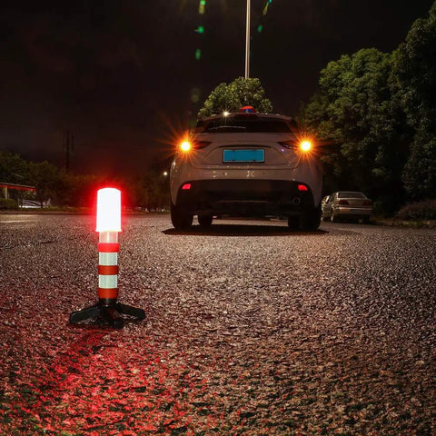 Must Have Emergency Roadside LED Flares Kit With Magnetic Base And Detachable Stand shown in use on roadside at night