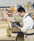 Man wearing General Purpose Nitrile Coated Work Gloves With Micro Foam Nitrile Grip so good for light oils assembling furniture