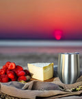Stainless Steel Double Wall Vacuum Insulated Wine Tumblers Keeping Icy Cold Beverages Chilled Or Piping Hot Coffee For Trail Blazing Tailgates And Backyard Hangs With Secure Lids Straws And Dishwasher Ease on beach with strawberries and cheese.