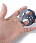 Hand holding Stainless Steel Beehive Entrance Disk 2.67 Inch Round Rotatable Bee Gate for Beekeeping No Fuss Install for Beehive Boxes