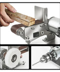 Close-up of Mini Electric Belt Sander Grinder With Variable Speed Control for polishing wood with an adjustable sanding band.