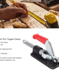 Push Pull Toggle Clamp For Heavy Duty Welding And Fabrication, 30607M Or 36330M in use on a wooden workbench.
