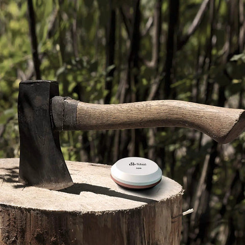 Dual Sided Axe And Hatchet Sharpening Stone With 180 Grit And 320 Grit For Quick Sharp Edges Pro Grade Whetstone next to axe