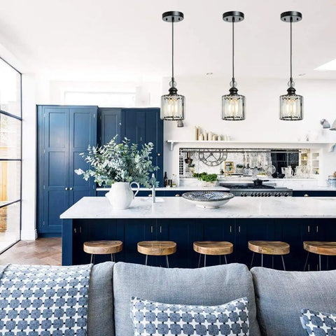 Kitchen island with Matte Black Crystal Pendant Lights 3 Pack, featuring industrial adjustable mini glam hanging crystal shades.