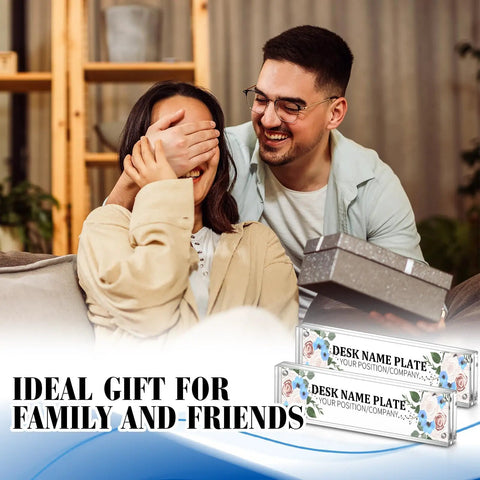 Couple with gift box and 4 Pack Clear Acrylic Desk Name Plates Set With Double Sided Design, Personalized Office Name Tag Blocks visible