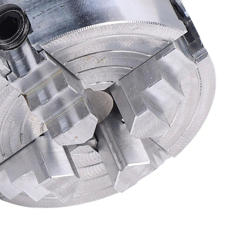 Close-up of 4 Jaw Lathe Chuck Set For Mini Lathe Alloy Steel Self Centering Wood Turning Chuck with jagged jaws