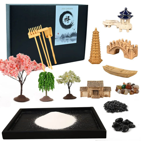 Mini Zen Garden Kit With White Sand, 10 By 7 Inch Rectangular Tray And Meditation Accessories laying out on a display table.