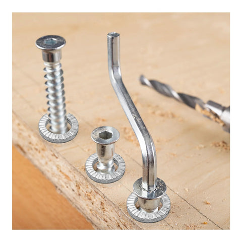 Close-up of M8 wedge lock washers (manganese steel) with screws on a wooden surface