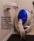 Cat approaching automated litter box with Litter Box Air Purifier for Cats and Small Pets with 53 CFM Stink Busting Power nearby.