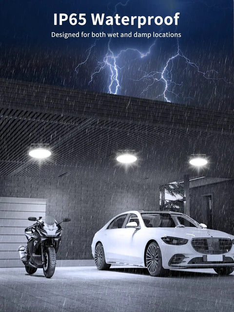Outdoor scene with Industrial High Bay LED Light 10 Pack 200W 20000LM UFO Flood Light 6500K Daylight IP65 Waterproof showing rain protection.