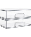 Clear Stackable Storage Drawers 2 Pack Wide Plastic Organizers shown stacked, perfect for organizing bathroom or kitchen items.