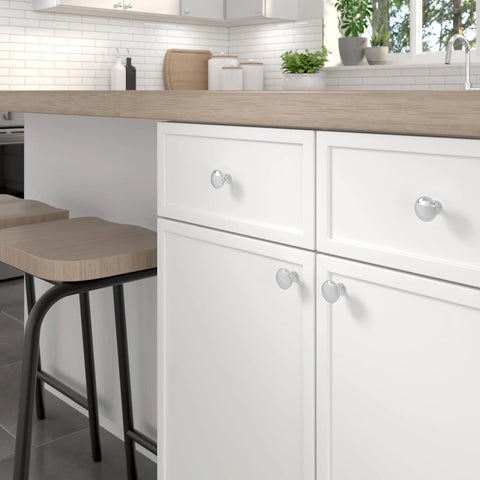 Copperfield Collection 1 3/16 Inch Chrome Mushroom Cabinet And Drawer Knob For Kitchen Bathroom And Furniture installed on white cabinets