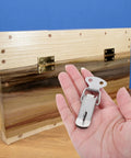 Get Your Toolbox Secure With 6 Sets Of Spring Loaded Toggle Latches Made From Durable Stainless Steel For Effortless Cabinet And Door Clasp Buckle Use With Mounting Screws Included, shown in hand.