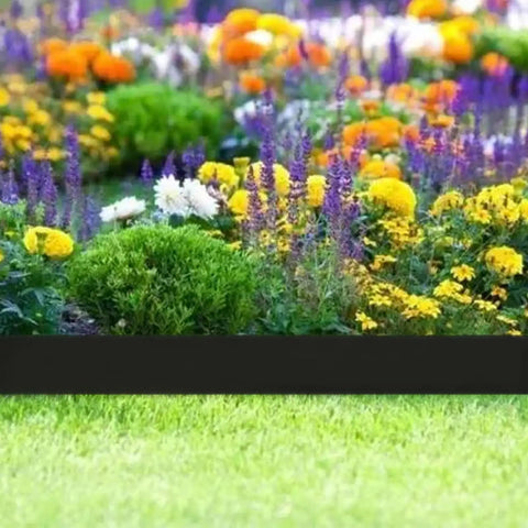 Flexible 33 Foot Garden Edging Border With 50 Spikes 4 Inch Lawn Border used in vibrant flower bed edging