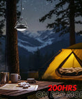 Gen 2 3000LM UFO Camping Lantern hanging in campsite at night with tent and mountains in background, 200-hour runtime.