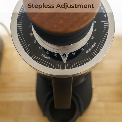 Top Shelf Single Dose Coffee Grinder Equipped With 83Mm Red Titanium Flat Burrs And Integrated Plasma Ionizer Chute For Zero Static Clumps Ideal For Home Brew Crews Chasing Consistent Pulls Without Any Headache In Classic Black with stepless adjustment dial.