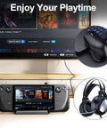 Gaming setup with a monitor displaying games, handheld console, wireless mouse, and gaming headphones, "Enjoy Your Playtime" text.