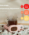 Keep Your Favorite Brew Piping Hot Desk Mug Warmer With Three Cozy Heat Levels And Gentle Glow Indicator For Home Office Coffee Cup Beverage Heater Continuously Locking In Ideal Sipping Temperatures Evergreen with a glass mug and pink warmer.