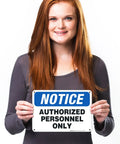 Woman holding Rugged Aluminum Authorized Personnel Only Sign For Indoor And Outdoor Use, Weatherproof And Rust Free, Clear, Boss Level Security Notice, Professional Grade, Long Lasting, High Visibility