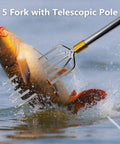 5 Fork with Telescopic Pole capturing fish, showcasing the Telescopic Fish Gaff With 5 Tooth Harpoon Replaceable Stainless Steel Fork.
