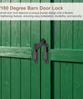 90/180 Degree Barn Door Lock installed on green wooden doors for secure closure.