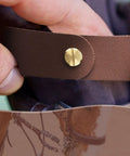 Close-up of six piece breakaway halter replacement straps for horses leather brown tough breakaway halter straps set easy fit.