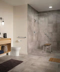 Modern bathroom with sleek fixtures, large walk-in shower, and vanity, showcasing Genta LX Modern Towel Bar 6.8 Inch Chrome For Kitchen Or Bath.