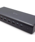 Crush Your Daily Workflow With This Rock Solid Laptop Stand And External Monitor Docking Station Featuring Ergonomic Height Adjustment And Slick Modern Design. Black USB hub with multiple ports.